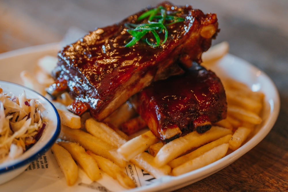 Slow cooked pork ribs and fries at The Locker Room