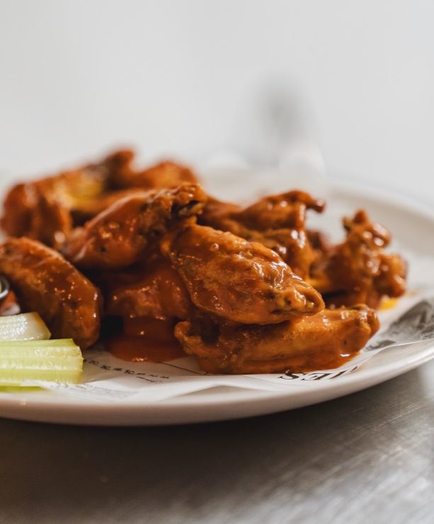 Plate of buffalo chicken wings at The Locker Room