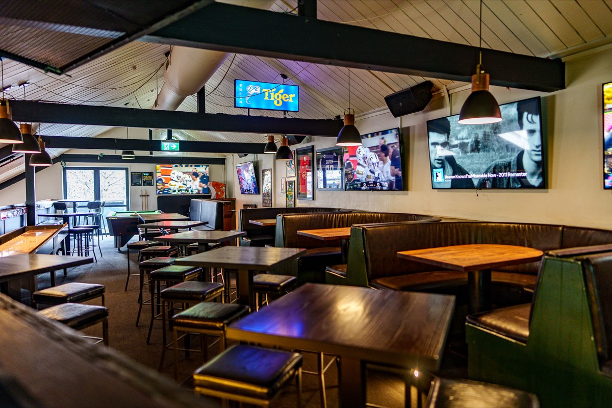 Upstairs games and lounge area at The Locker Room