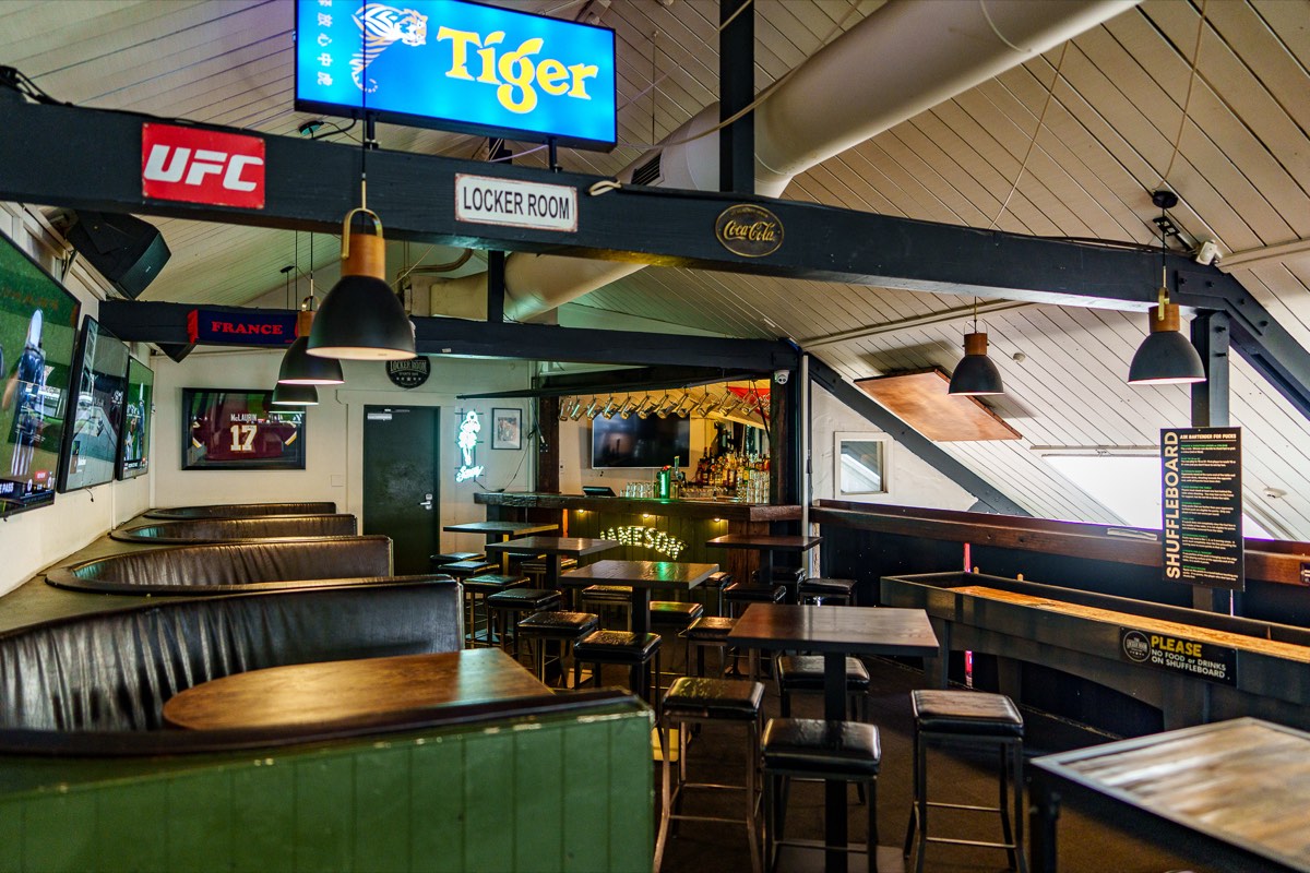 Shuffleboard and games corner at The Locker Room
